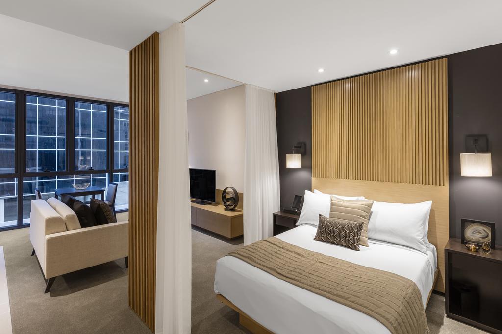 Skye Hotel Suites Parramatta Exterior foto A bedroom at the hotel