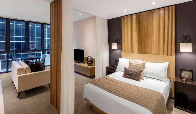 Skye Hotel Suites Parramatta Cameră foto A bedroom at the hotel